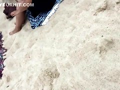Naked pussy of a beach girl