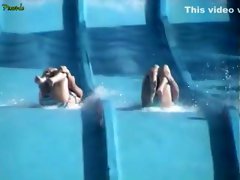 Accidental nipple slip at a water slide