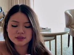 Beautiful Asian teen gives deep blowjob