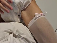 Diapered sissy in a tutu jerks off and fucks a pillow