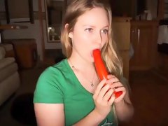 College cutie plowing her holes with a red dildo on webcam