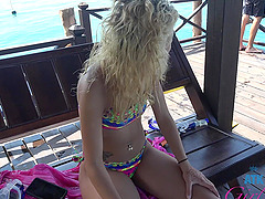 Amateur blondie Carmen Caliente in bikini posing for the camera